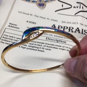 14K gold opal and diamond bracelet.